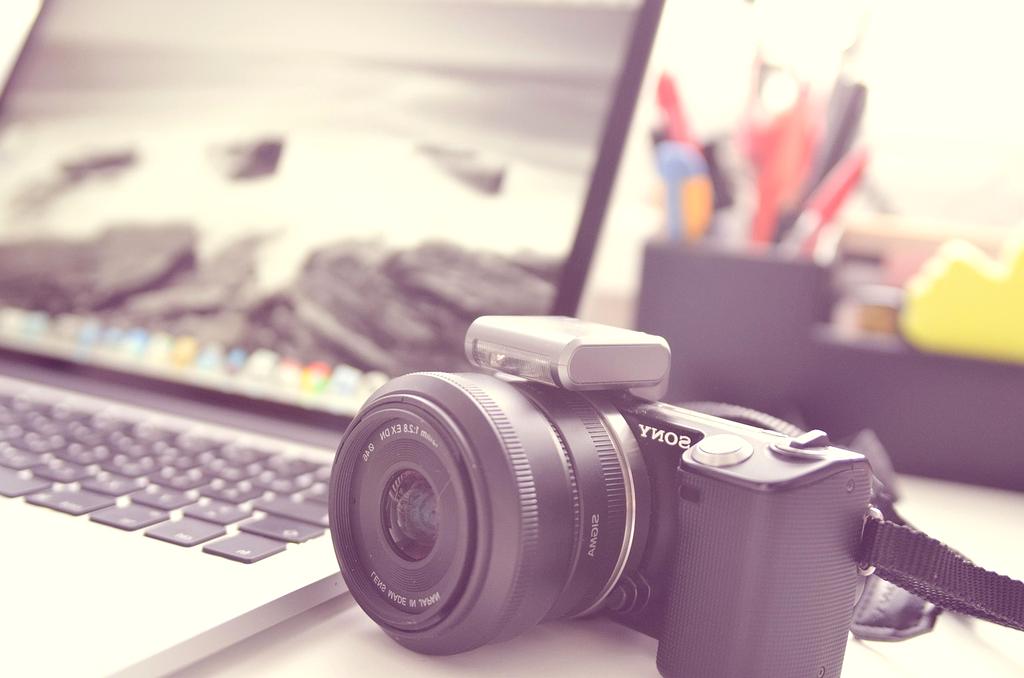 Camera operator filming short-form social content on set